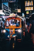 person riding on Taxi cub