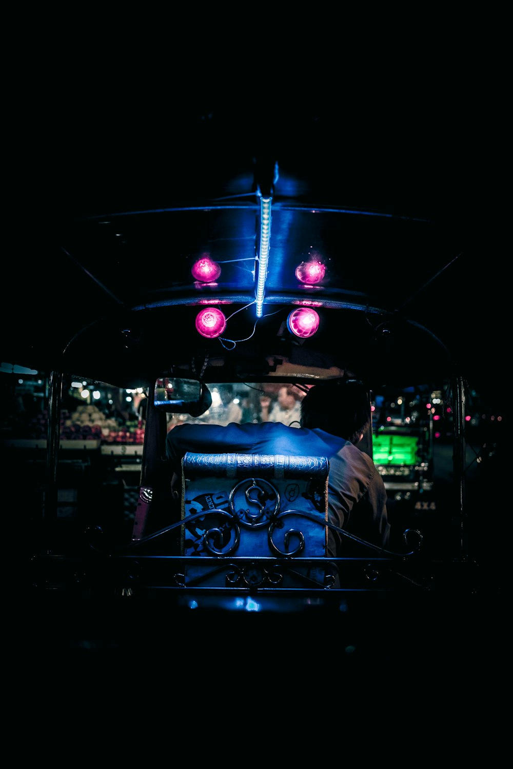 person sitting inside the vehicle