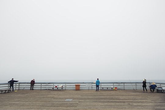 several people on dock in San Clemente Pier United States