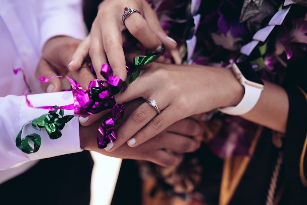 man and woman touching hands