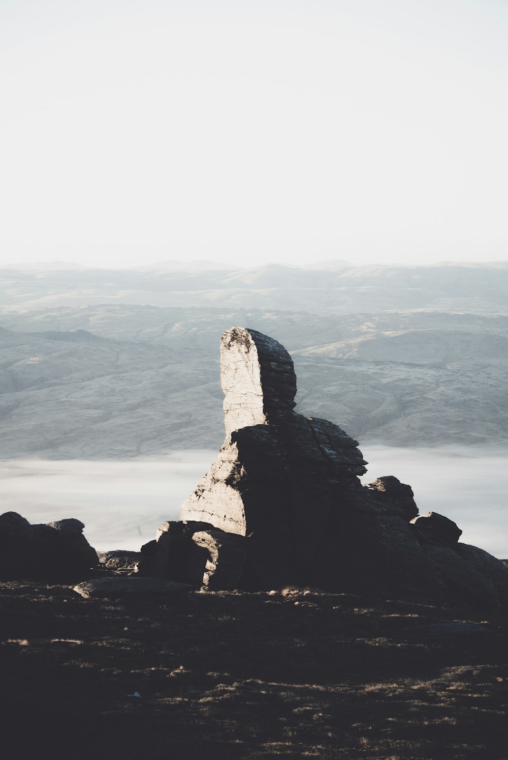 stone formation under sunny sky