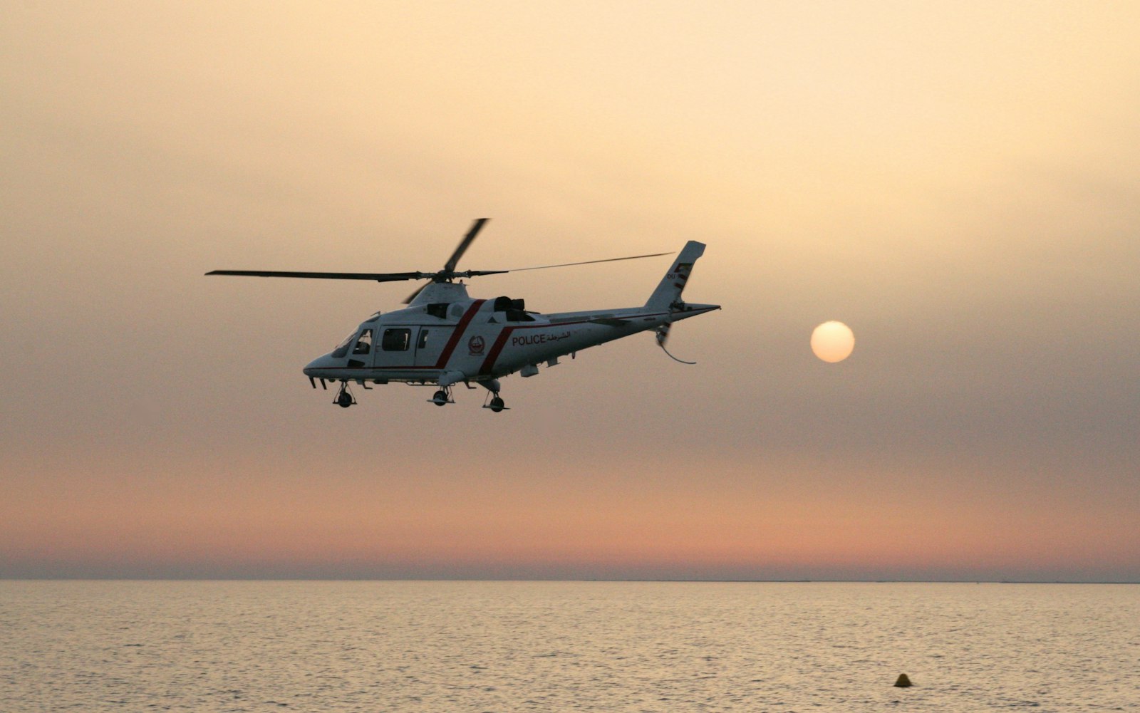 Canon EOS 30D sample photo. White and red helicopter photography