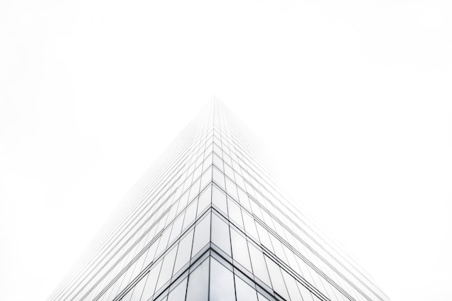 bottom view of glass building