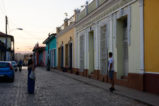 Warm sunset view of San Miguel de Allende's cobblestone streets and colonial buildings.