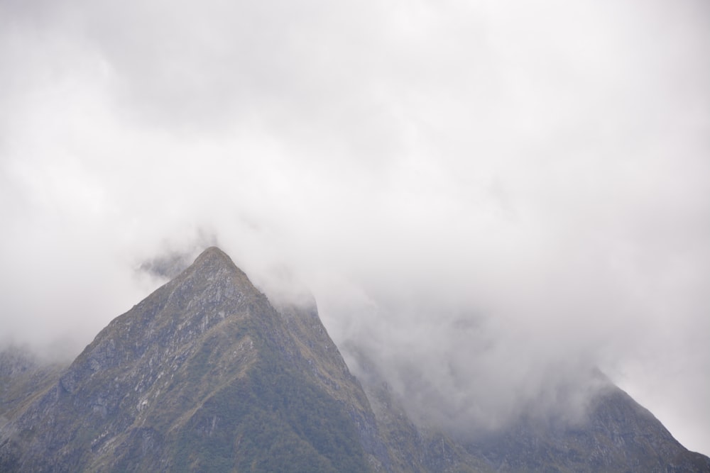 mountain view under cloudy sky during daytime