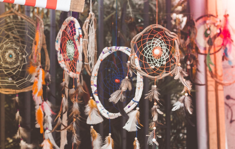 closeup photo of hanging dream catchers