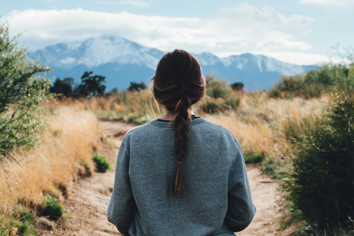 Woman walking along a pathway