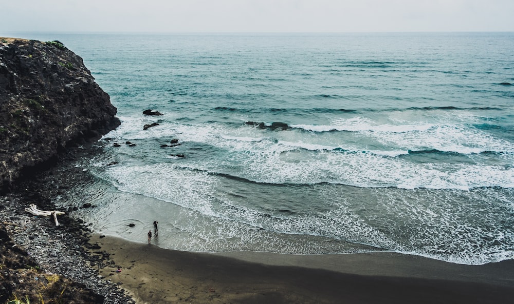 waves crashing shore