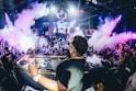 man playing DJ turntable