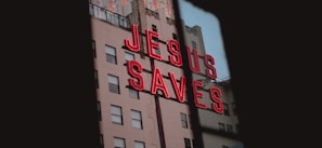Jesus Saves LED signage on concrete building