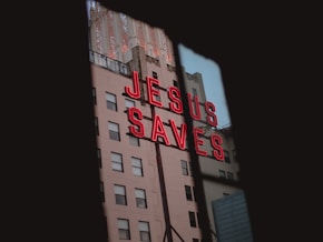 Jesus Saves LED signage on concrete building