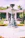 A beautifully crafted decorative concrete fountain in a lush garden setting.