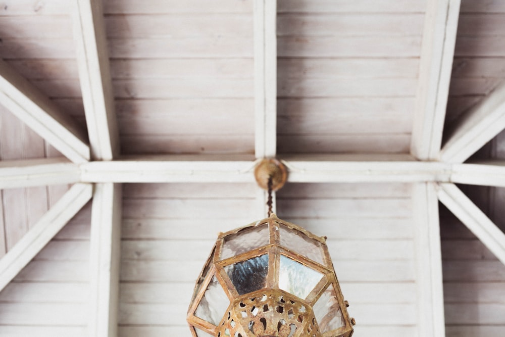 worm's eye view of pendant lamp on white ceiling