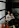 man sitting on a armchair beside window