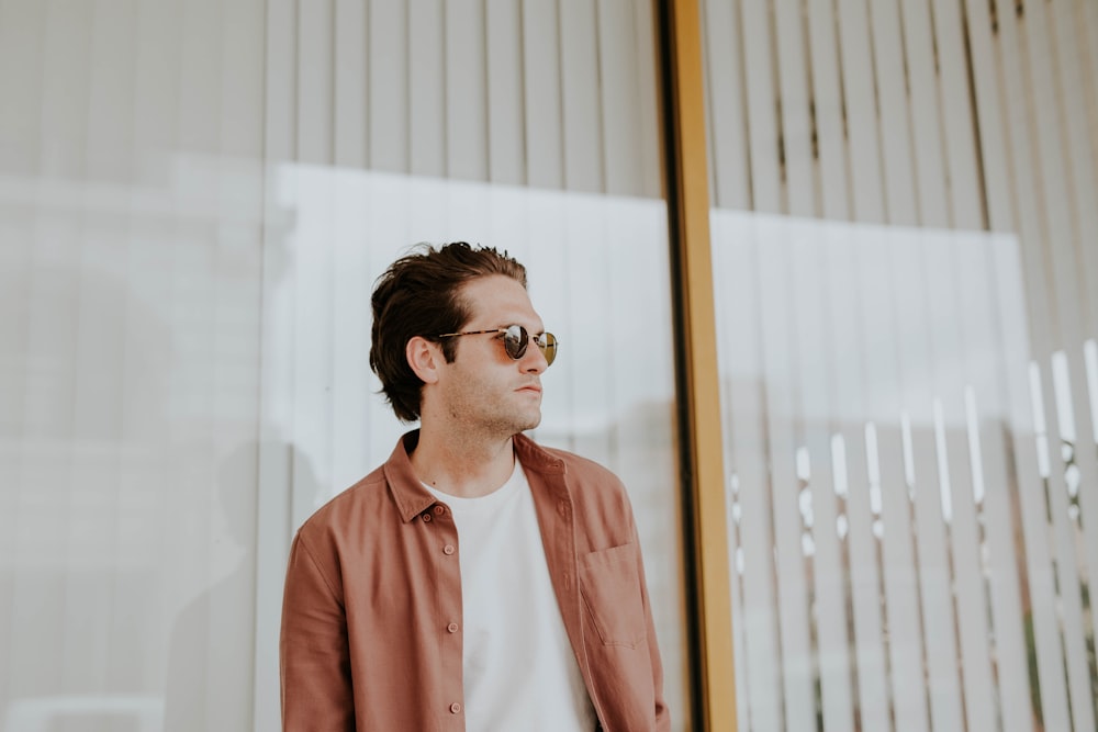 man wearing brown leather jacket