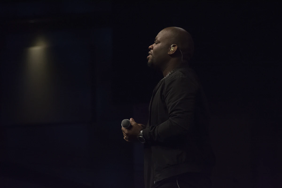 Vocalist singing in a church service; contemporary illustration of gospel performance