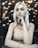 shallow focus photo of woman sitting on chair
