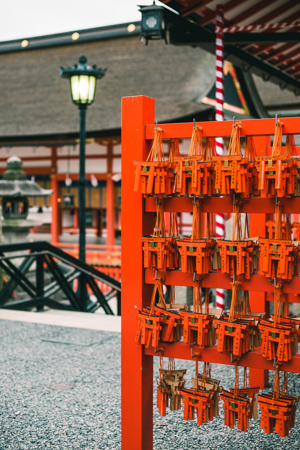 shallow focus photography of wooden chimes