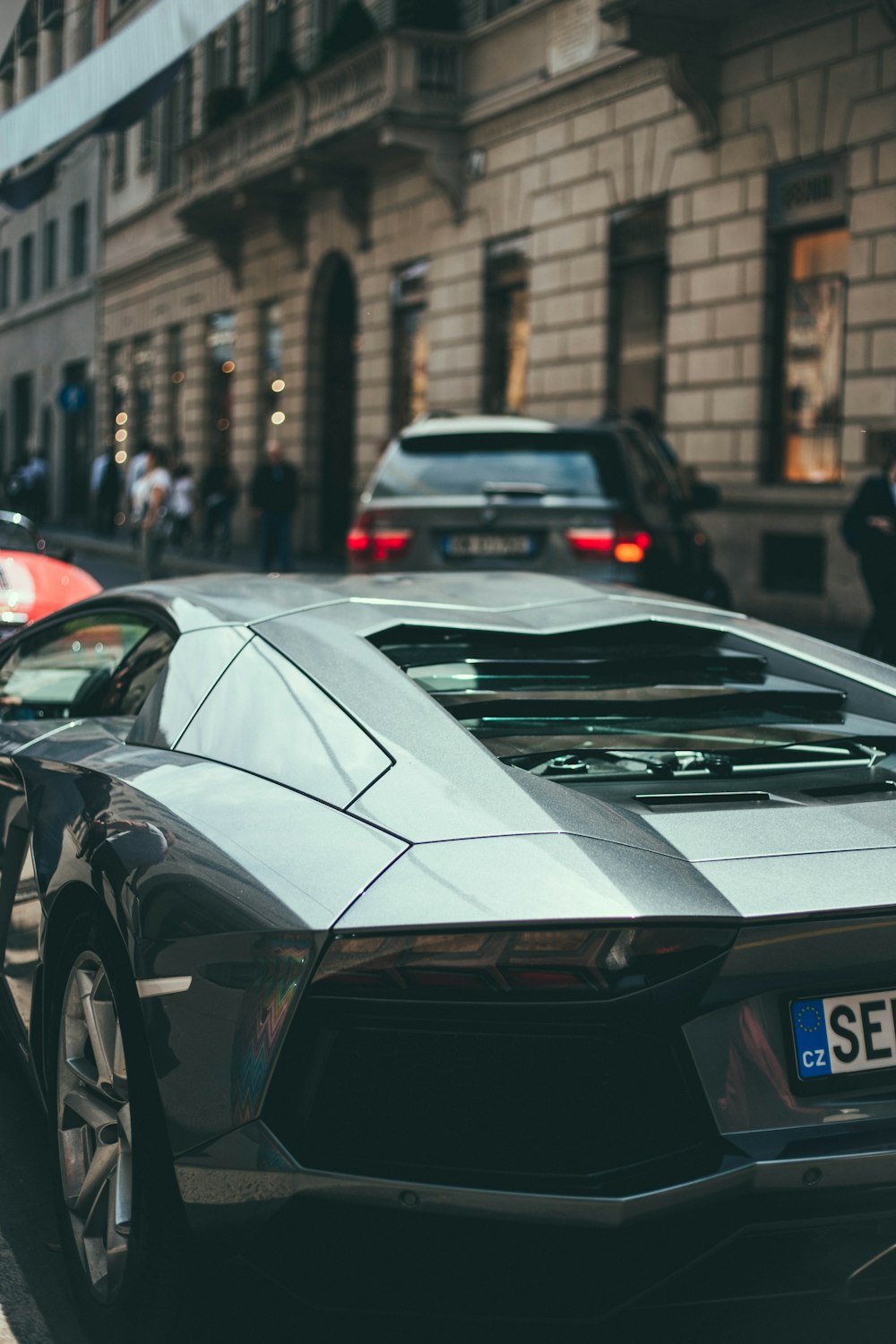 A parked car sitting outside.