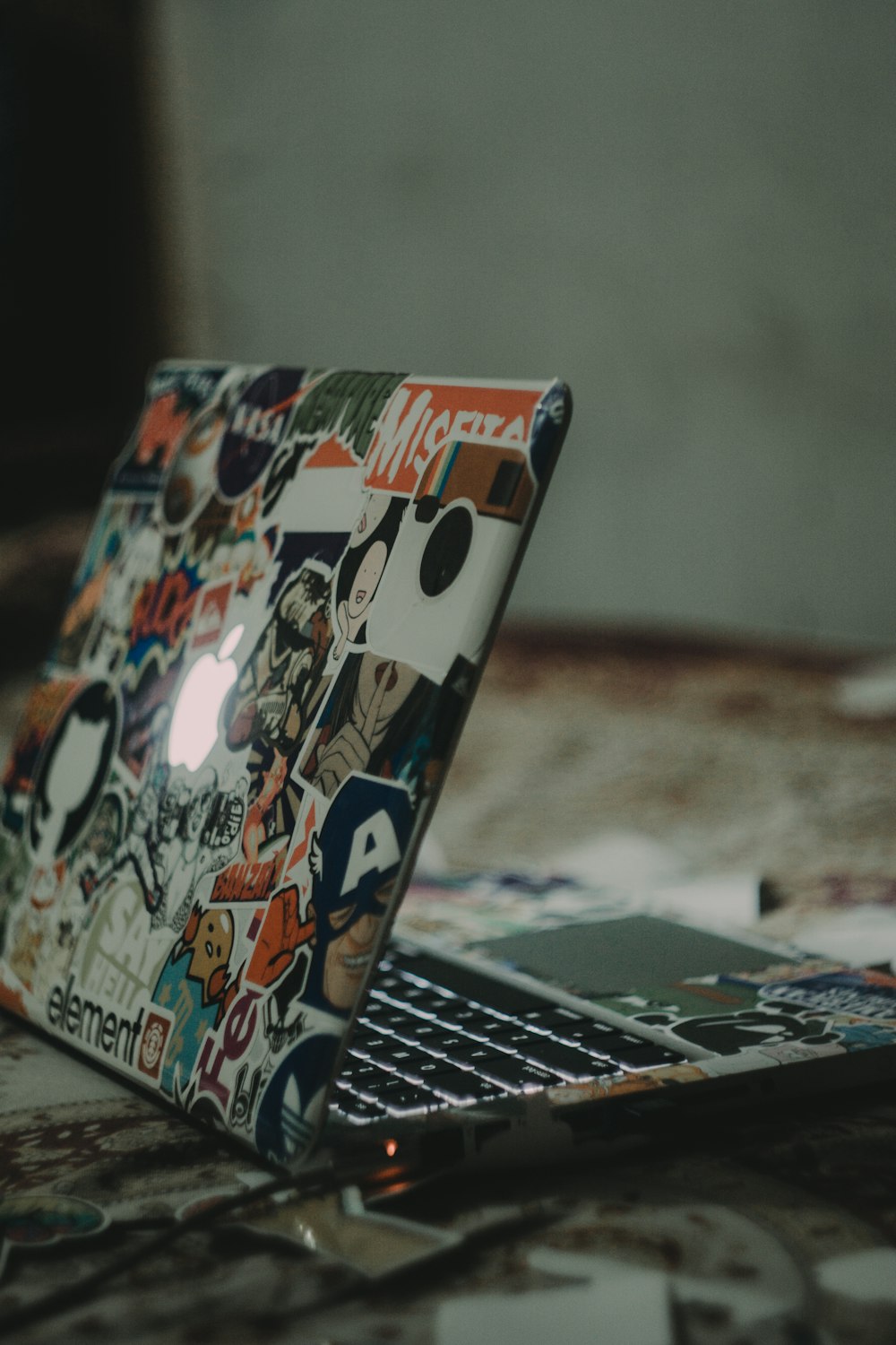 black and white laptop on floor