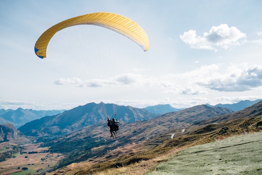person on parachute in Queenstown New Zealand