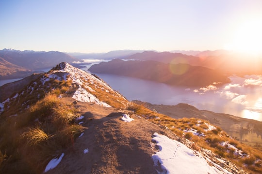 icy mountain during day time in Roys Peak New Zealand