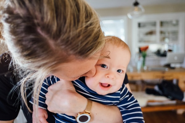 cute baby, smiling baby, mom kissing baby