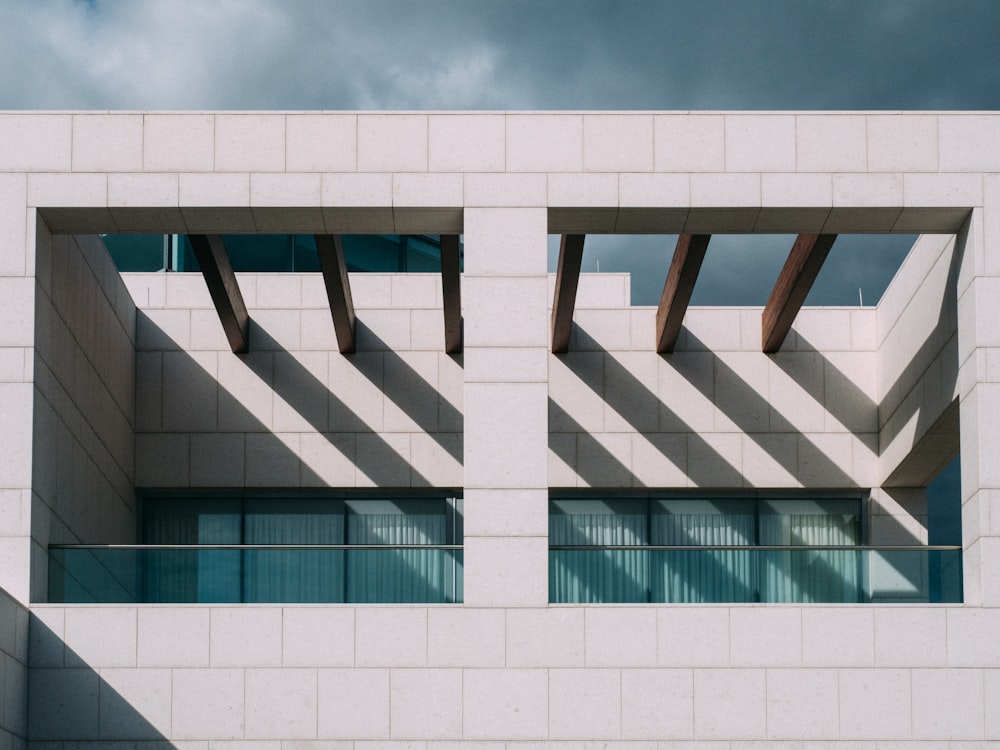 closeup photo of white and blue building