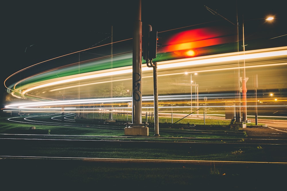 timelapse photography of post lamps at nighttime