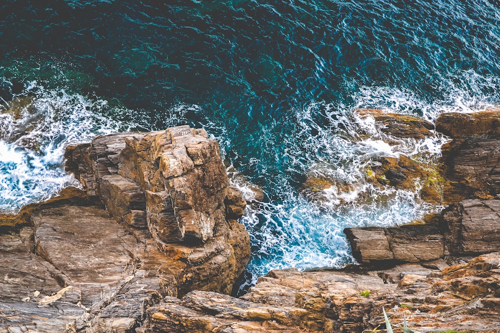 ocean waves crashing rocks