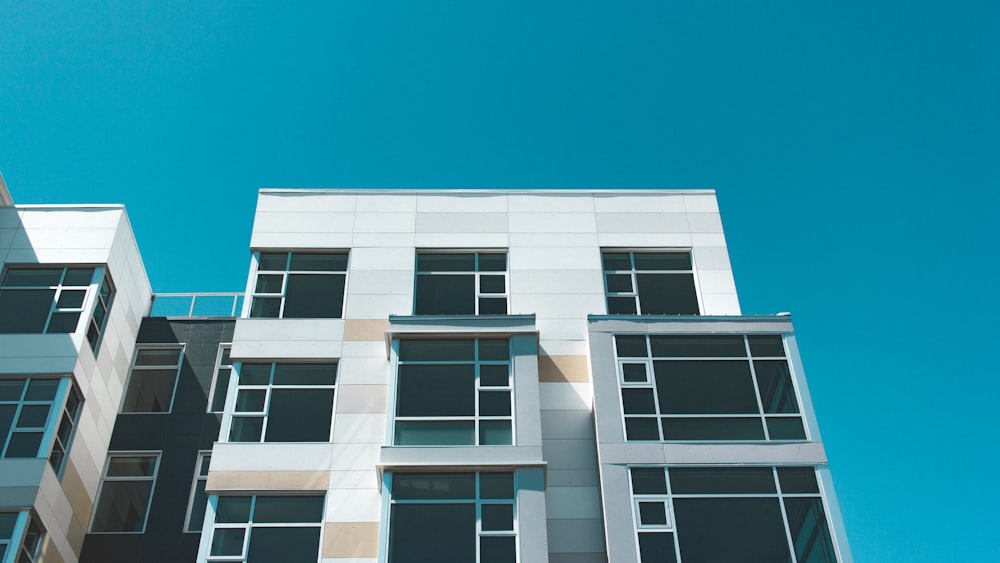 low angle photography of white building