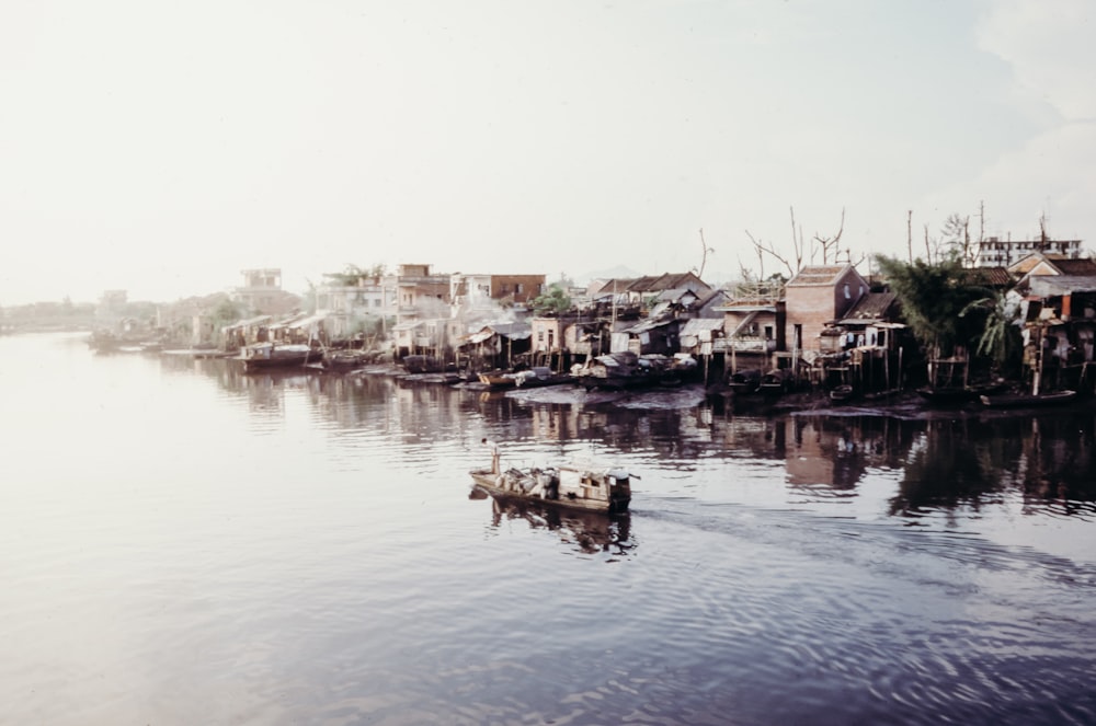 houses beside body of water