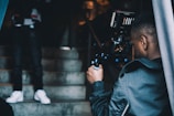 man taking photo of another man