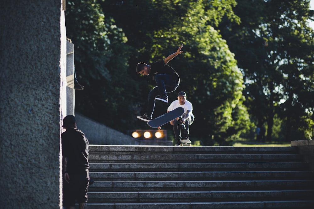 man jumping on skateboard outdoors