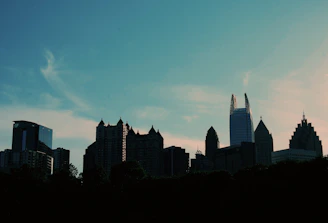 City skyline blending elements from Santiago and São Paulo under a clear sky.
