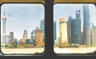An aerial view of a city skyline with clean windows on skyscrapers.