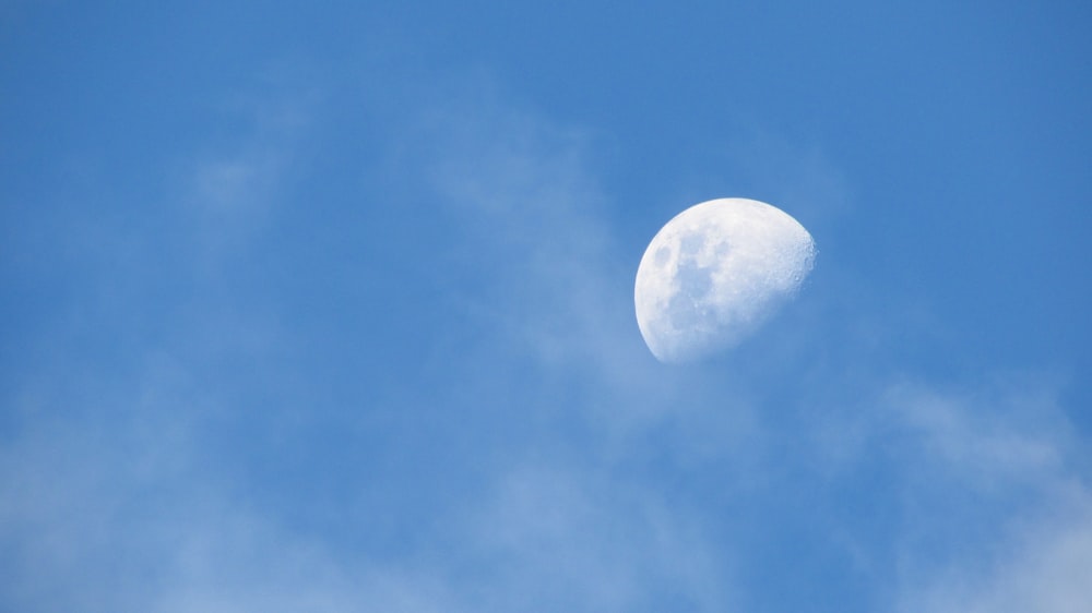 low angle photo of half-moon