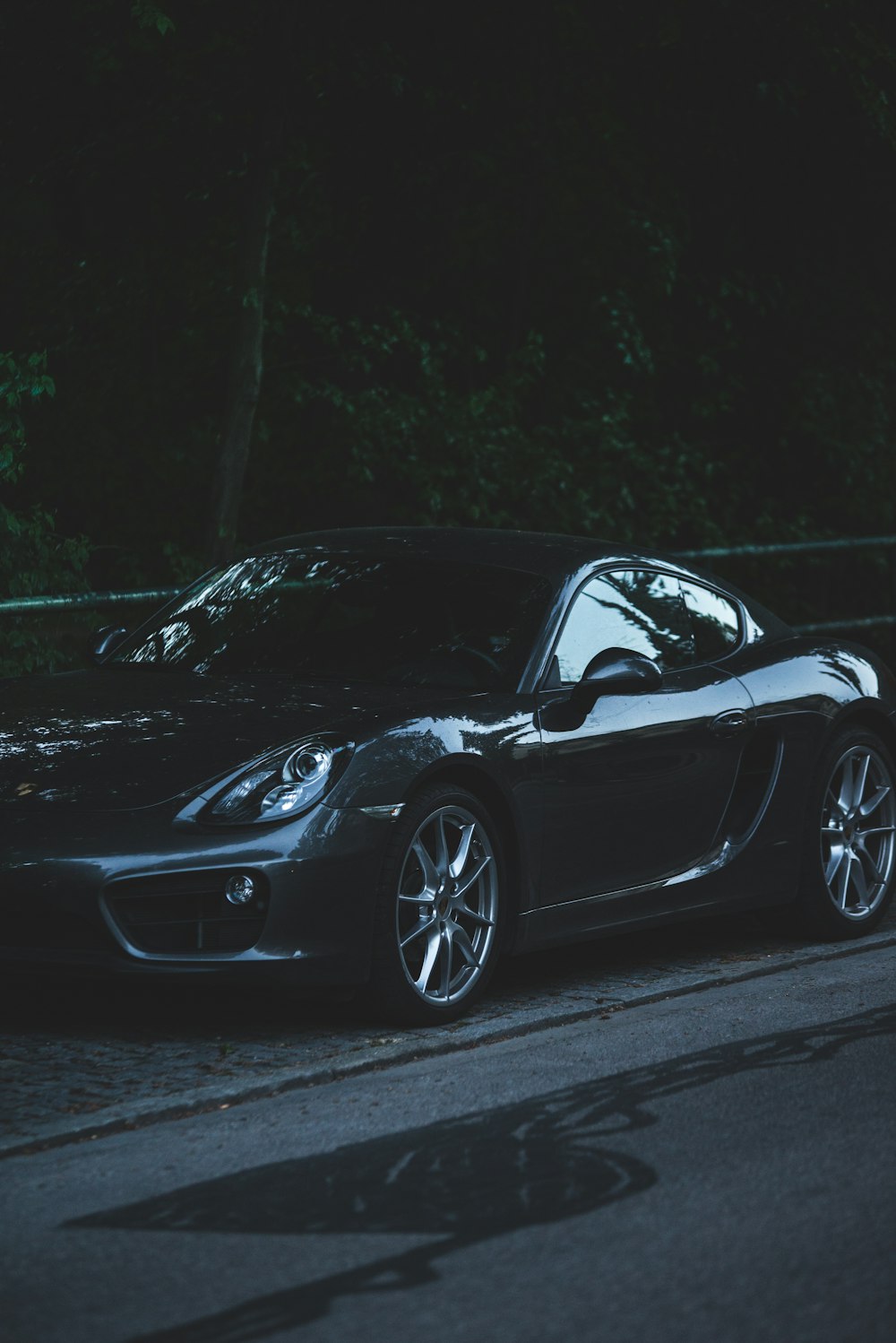 A parked car at night.