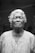 grayscale photo of closed-eyes woman