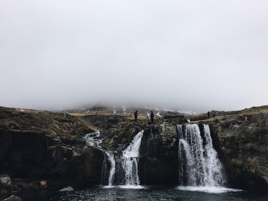 time lapse photography of waterfalls in Kirkjufell Iceland