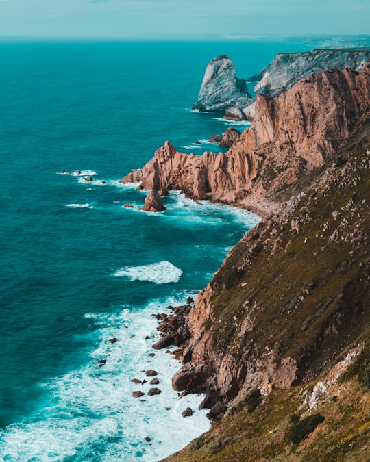 body of water across mountain in Sintra-Cascais Natural Park Portugal