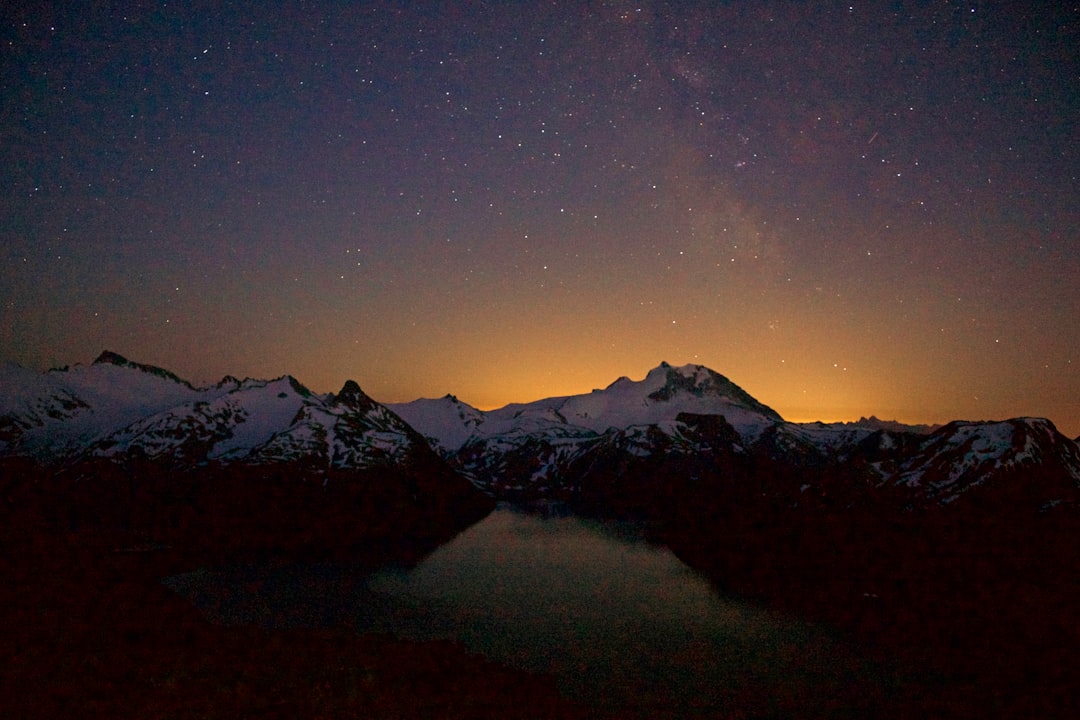 snow covered mountains at night