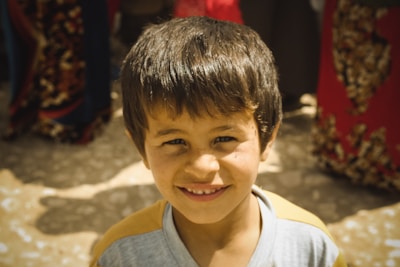 Sharma Boy greeting fans with a warm smile backstage.