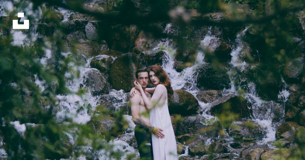 Man Hugging Rocks Man and woman hugging on running water surrounded by rocks photo – Free ...
