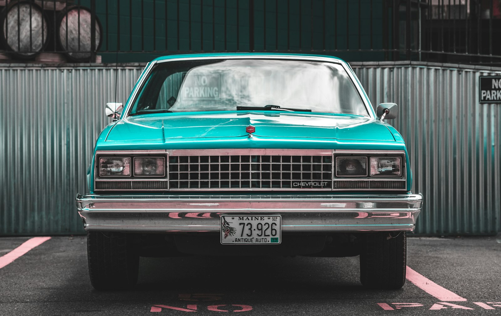 Canon EOS 750D (EOS Rebel T6i / EOS Kiss X8i) + Canon EF 24-70mm F2.8L II USM sample photo. Teal chevrolet car parked photography