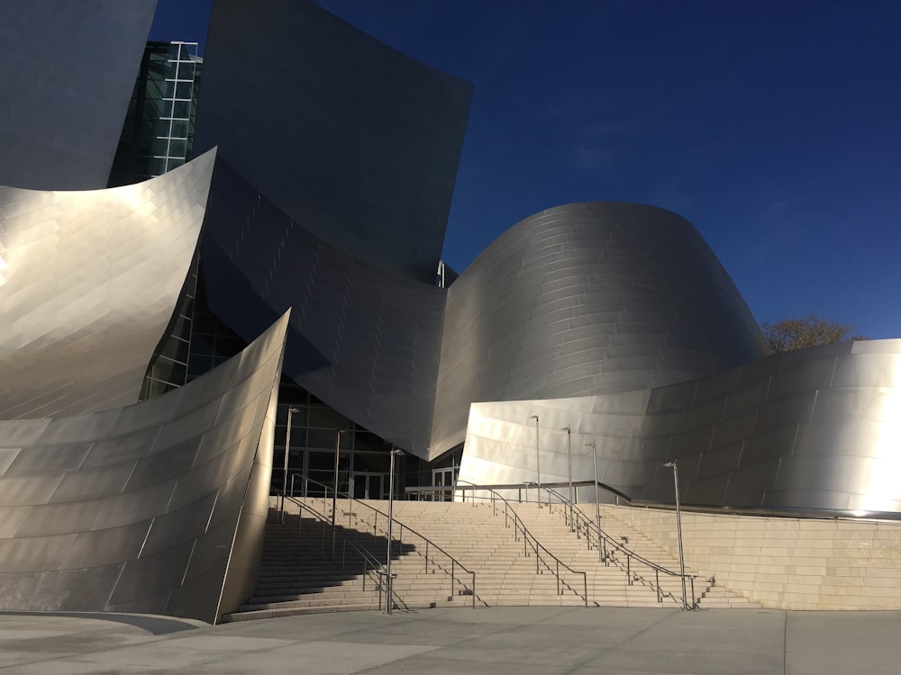 gray concrete building under blue sky during daytime