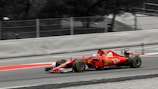 An iconic Formula 1 car racing on a track.
