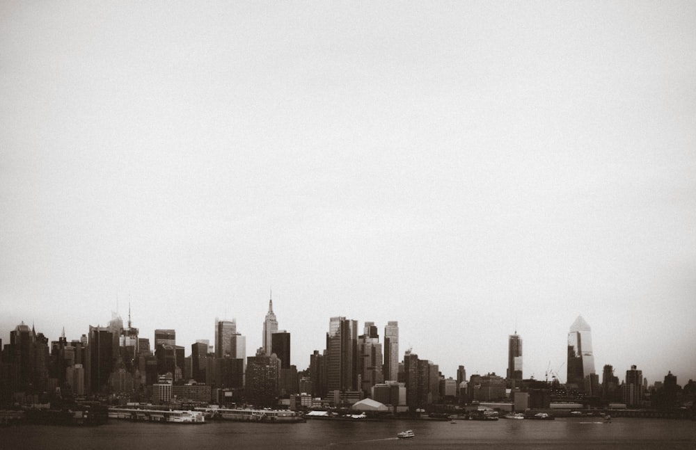 city skyline under white sky during daytime