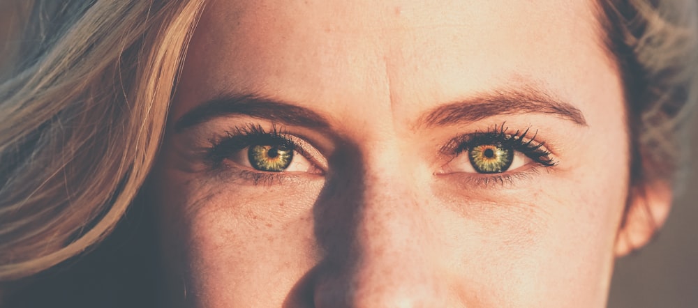 close-up photo of woman's face