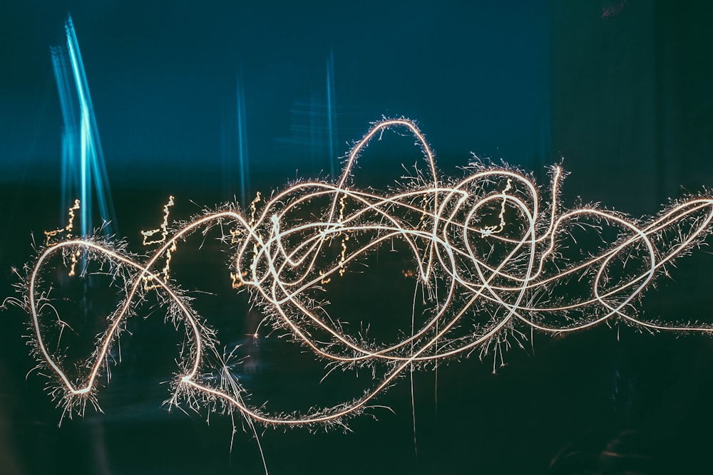 white string on black background